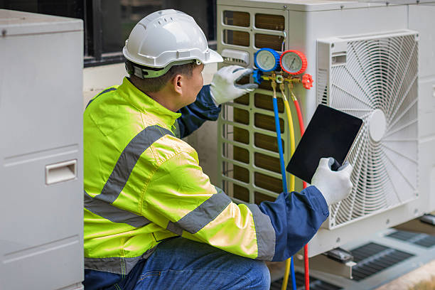 Professional Air Conditioning Repair technician working in Montague, MI